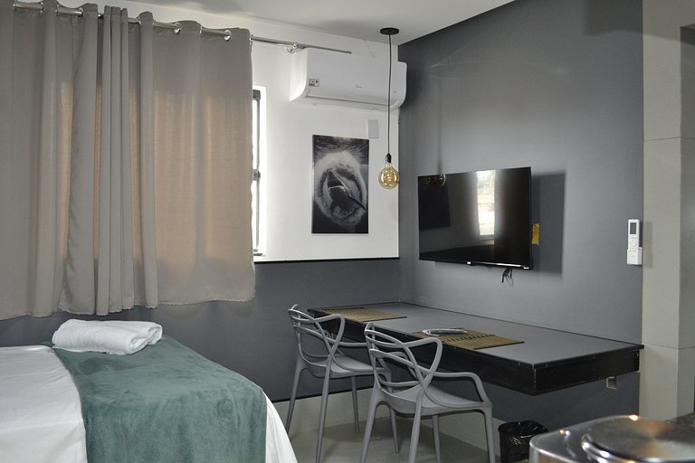 Estudio impecable con cocina completa y lavadora